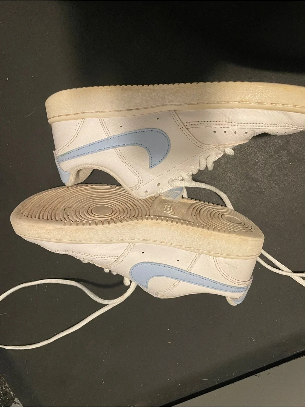 Nike White Low-Top Sneakers with Light Blue Swoosh